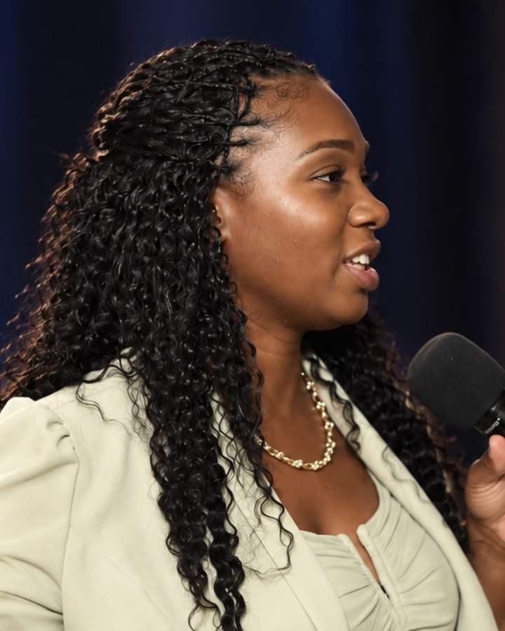Roxanne Kentish speaking with a microphone