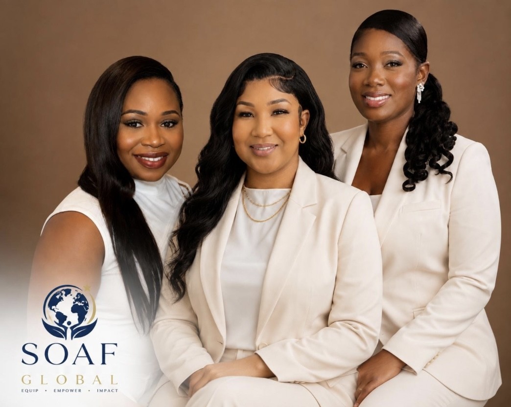 The SOAF Global team: three women in cream suits